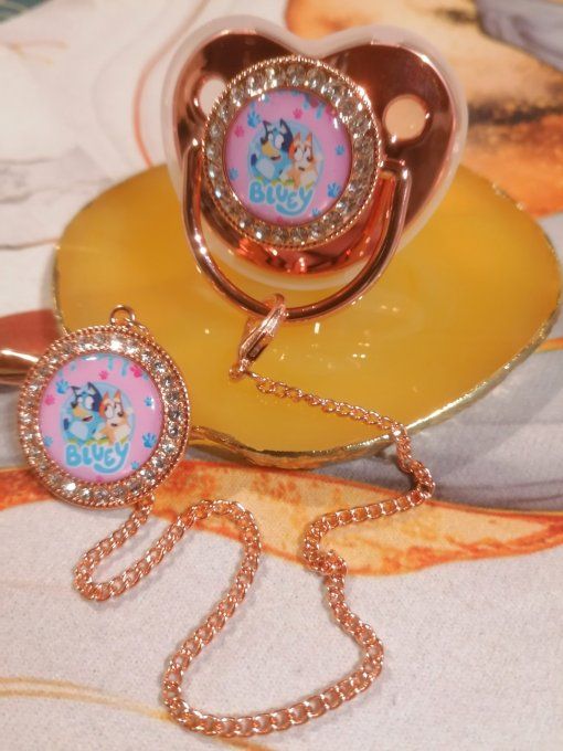 Tétine, sucette avec attache Bluey bleu rose 