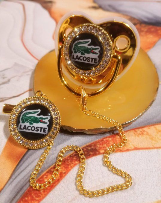 Tétine, sucette avec attache Lacoste